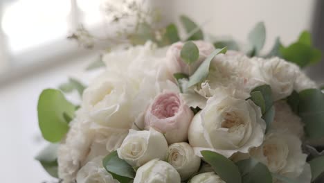 Bride-holding-a-beautiful-wedding-bouquet