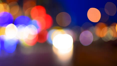 Blurry-of-the-traffic-lights-street-view,-Bokeh-of-night-life-street-view