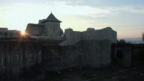 Autumn-sunset-over-old-fortress-from-Romania-country,-Suceava-city