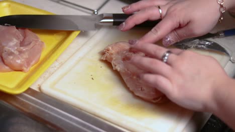 Using-toothpicks-to-ensure-the-filled-chicken-breast-doesn't-open-during-baking