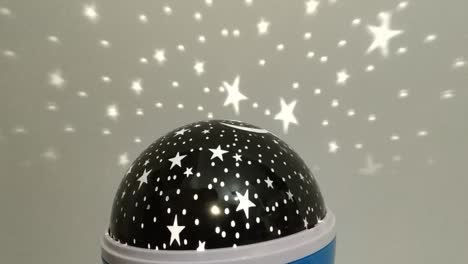 Rotating-Night-Lamp-Projector-with-White-Stars-and-Moon