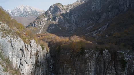 Hiking-around-Theth-to-the-Blue-Eye,-Grunas-waterfall-and-in-the-Albanian-Alps-during-Fall-season-or-autumn-season
