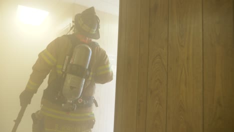 Firefighters-walks-in-a-burning-and-smoky-building-to-find-and-rescue-people
