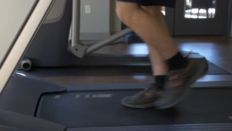 Firefighter-running-on-a-treadmill-to-stay-in-shape-and-train-for-emergency-response