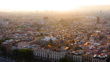 Cityscape-of-Barcelona-at-sunset-with-Passeig-de-Colom-and-Port-Vell-walkway,-Spain