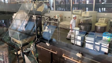 A-behind-the-scenes-look-inside-the-popular-BOUDIN-bakery-and-sourdough-bread-making-factory-in-San-Francisco,-California