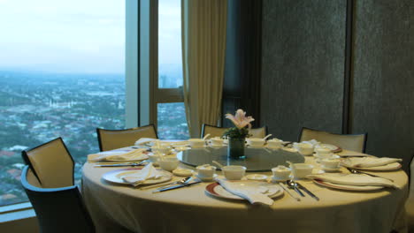 Panning-Shot-Of-A-Formal-Setting-Dinner-With-An-Over-Looking-View