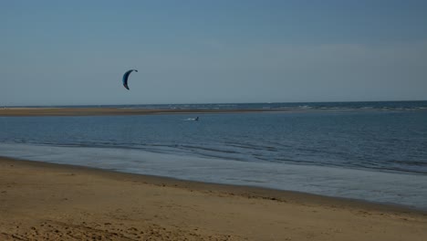 A-kitesurfer-moving-towards-left-in-the-Spain´s-coast
