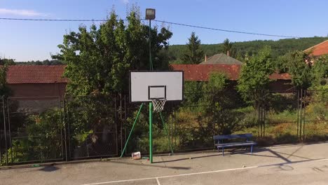 An-empty-basketball-court-flying-around-the-basket