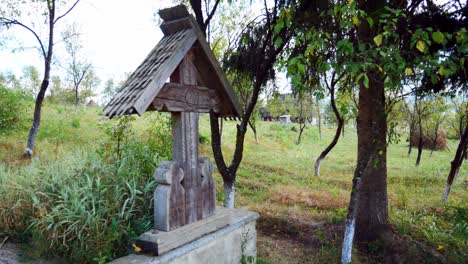 Pedestal-up-shot-of-an-old-tomb-in-a-romanian-rural-cemetery