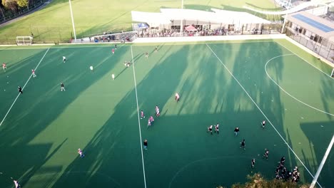 Rising-up-drone-footage-during-a-break-in-a-men's-premier-league-field-hockey-match-at-Elgar-Park