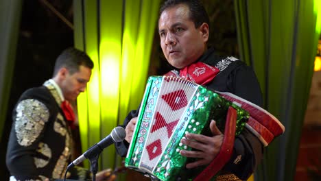 Closeup-of-mariachi-band-accordion-player-on-stage-in-Merida,-Mexico