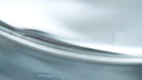 Abstract-macro-art-shot-of-a-petri-dish-filled-with-water