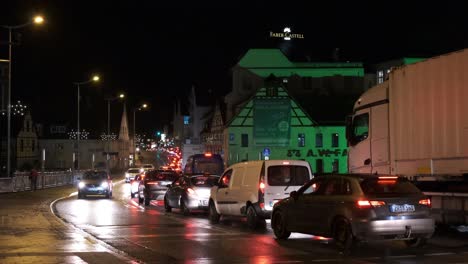 Traffic-jam-at-the-entrance-of-the-german-city-Stein,-with-many-cars-and-trucks-moving-at-a-slow-pace
