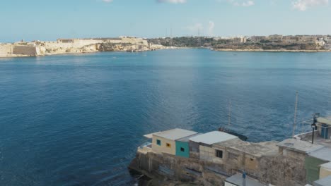 Wide-shot-of-a-Valletta-bay,-where-cruiseships-enter-the-harbour-of-the-city