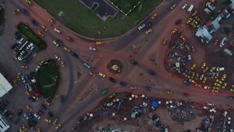 Aerial-bird's-eye-view-of-Senegambia-Highway-and-the-Coastal-Road-roundabout-in-The-Gambia-Africa-at-twilight