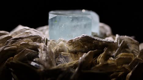 A-very-tight-macro-shot-of-a-rare-aquamarine-sample-nested-in-muscovite-from-Argentina