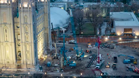 Construction-crew-and-equipment-renovating-the-Salt-Lake-City-Temple---early-morning-time-lapse
