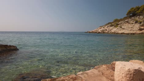 View-of-the-Adriatic-Sea-with-a-white-rocky-shoreline-on-the-island-of-Vis-in-Croatia