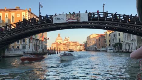 The-Ponte-dell'Accademia-bridge-in-Venice,-Italy-during-peak-Spring-travel-season