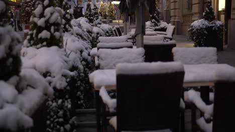 Closed-down-snowy-terrace-patio-in-the-city