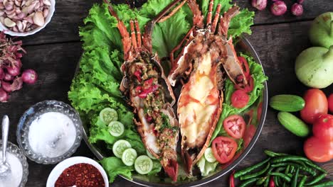 Beautiful-top-down-view-Lobster-Plate-with-vegetables-displayed-on-decorated-Wooden-table