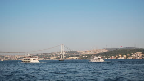 Cityscape-of-Bosphorus-with-Marmara-Sea-and-Iconic-Bridge-of-Istanbul-City-between-Asia-and-Europe-Continents-with-Ships-on-Blue-Water