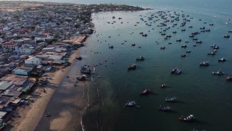 Aerial,-Vietnam-cramped-overpopulated-fishing-village-in-Mui-Ne