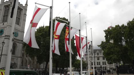 Commonwealth-Flags-Fluttering-In-Wind-At-Parliament-Square-In-Westminster-On-Overcast-Day