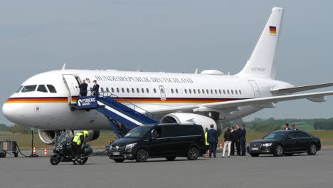 Danish-Officials-And-Escort-At-The-Esbjerg-Airport-To-Welcome-German-Chancellor-Olaf-Scholz-Deboarding-German-Air-Force-Airbus-A320-For-The-EU-Summit
