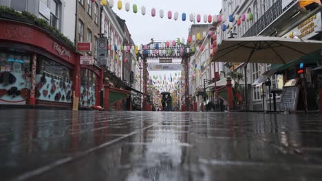 Low-angle-of-empty-rain-London-chinatown-due-to-Covid-lockdown-restrictions