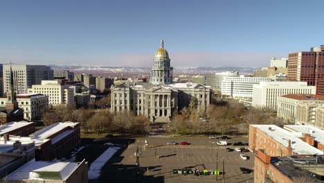 Low-altitude-cinematic-drone-push-in-towards-the-Colorado-State-Capitol-building-in-Denver,-CO