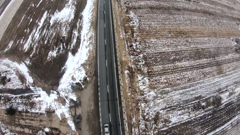 Drone-above-a-road-in-Winter
