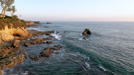 Flying-over-the-beautiful-Laguna-Beach-tide-pools-at-Sunset-in-California