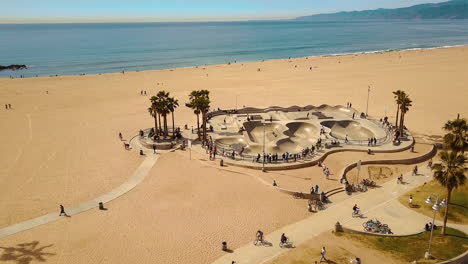 Drone-footage-over-the-bike-path-and-skate-park-in-Venice-beach-California