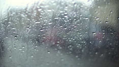 drops-of-rain-on-the-window-of-the-car-close-up