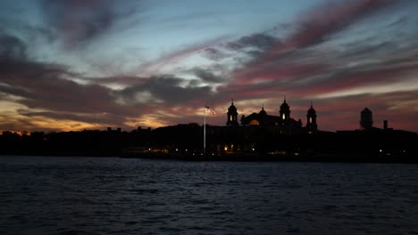 Passing-Ellis-Island-at-sunset-on-the-Upper-New-York-Bay