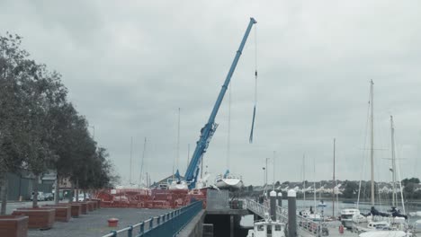 Crane-getting-into-position-to-lift-out-boats