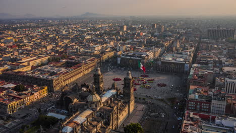 Aerial-hyperlapse-of-the-main-plaza-of-Mexico-City-know-as-El-Zocalo-with-Christmas-decoration-and-the-mexican-flag