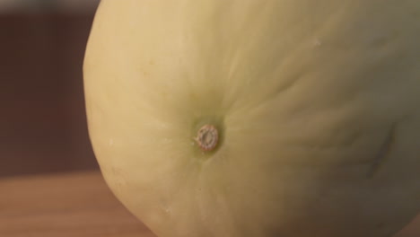 Close-up-of-a-whole,-ripe-honeydew-melon