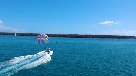 Young-adventure-seeking-people-parasailing-to-get-a-adrenaline-rush