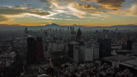 Aerial-hyperlapse-of-a-epic-sunrise-in-the-financial-zone-of-Carso-in-Mexico-City