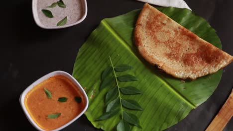Masala-dosa-is-a-South-Indian-meal-served-with-sambhar-and-coconut-chutney