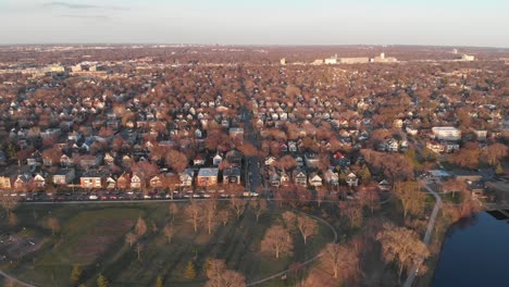 Aerial-footage-neighborhood-horizon-during-golden-hour