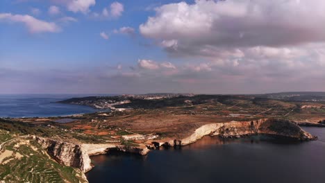 Hyperlapse-drone-video-from-Malta,-Mellieha-area,-showing-the-beautiful-landscape-on-a-calm-autumn-afternoon