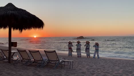 A-traditional-sunset-show-at-the-Four-Seasons-vacation-resort-in-Punta-Mita,-Riviera-Nayarit,-Mexico