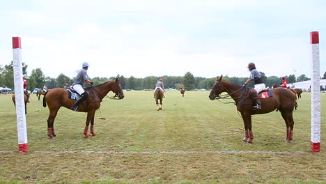 polo-players-on-horses-scoring-a-point