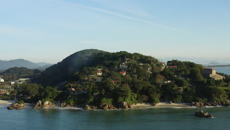 Aerial-drone-view-rainforest-paradise-beach,-Jurere-Internacional,-Florianopolis,-Santa-Catarina,-Brazil