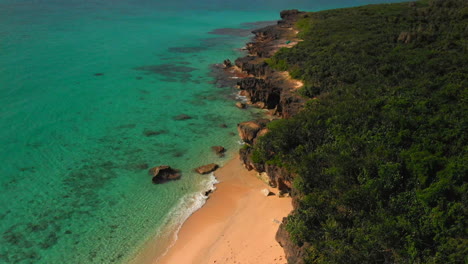 Aerial-view-of-tropical-water-along-a-beautiful-shoreline