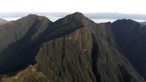 Beautiful-aerial-approaching-of-the-summit-of-a-rainforest-tropical-mountain,-Pico-Caratuva,-Brazil,-South-America